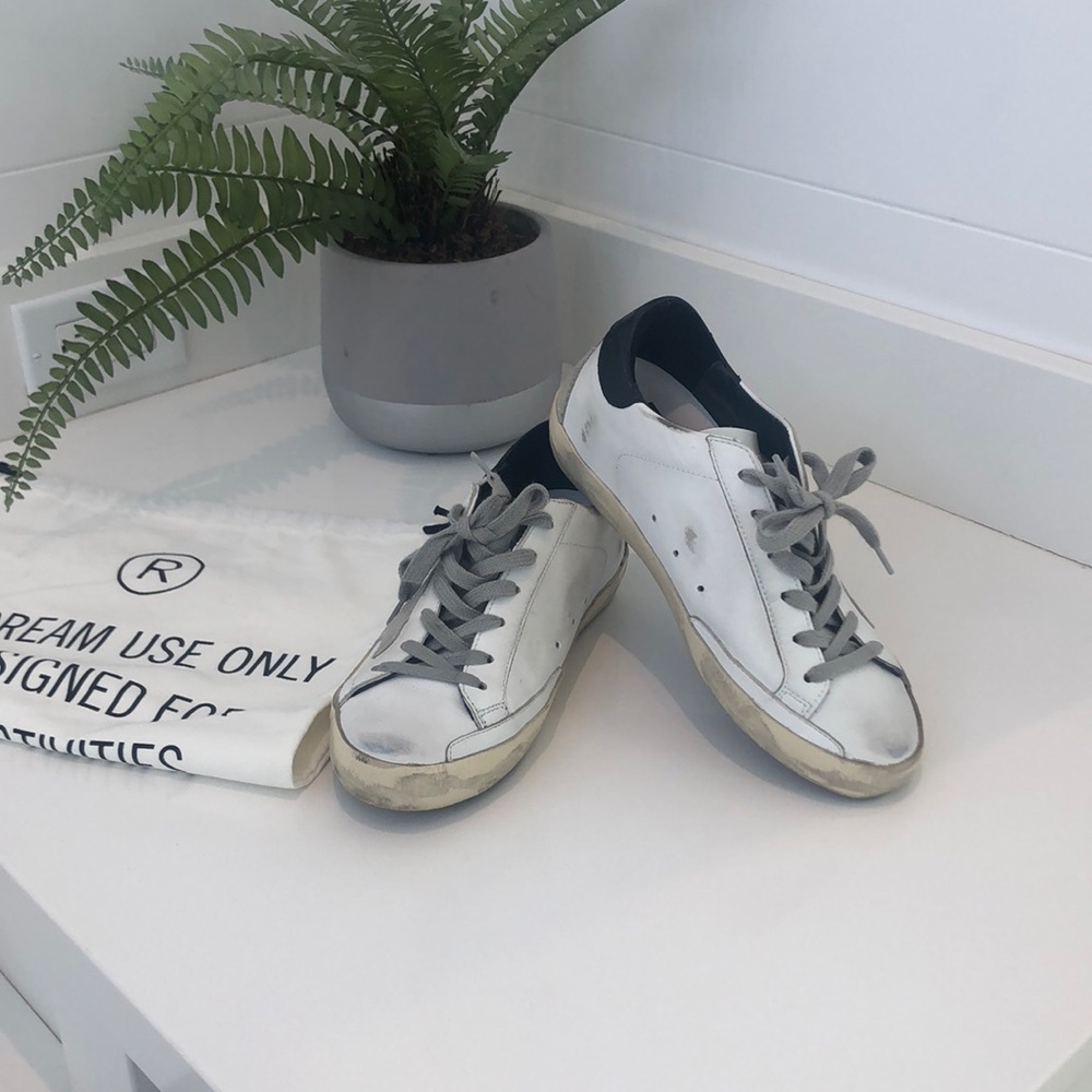 Golden Goose navy and white superstar sneaker. 36
